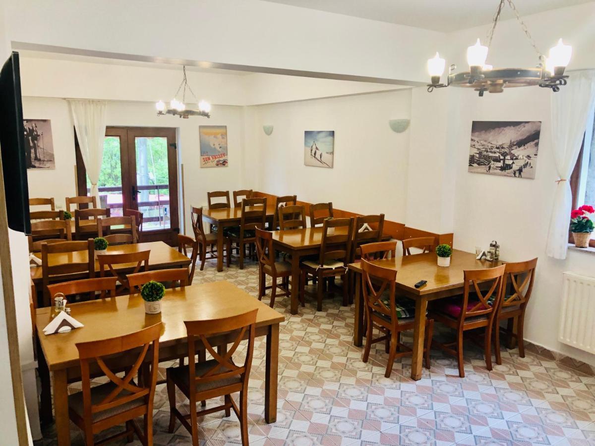 Pensiune & Restaurant Kalinder Буштени Экстерьер фото